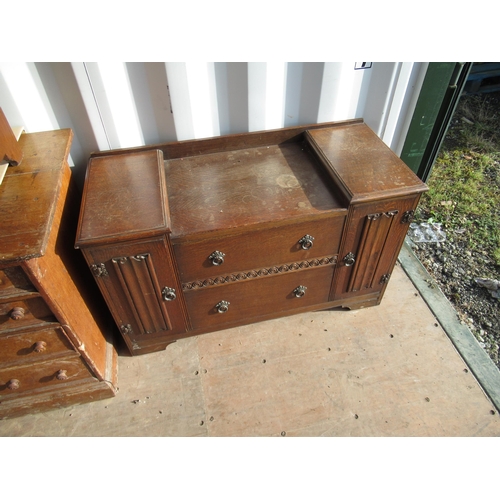 691 - C20th oak dressing table, two drawers enclosed by linen fold panel drawers and an oak chest of three... 