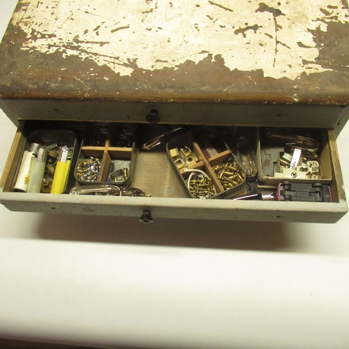 415 - Quantity of Ronson and other pocket lighters, spares, flints and repair items in three drawer cabine... 