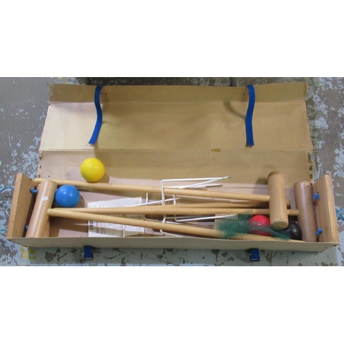 873 - Croquet set in a travelling cardboard/wood case comprising 4 mallets, 4 balls, etc.