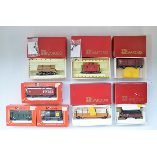 111 - Collection of boxed Rivarossi HO gauge goods wagons including log transporter, Flat Car, Caboose etc... 