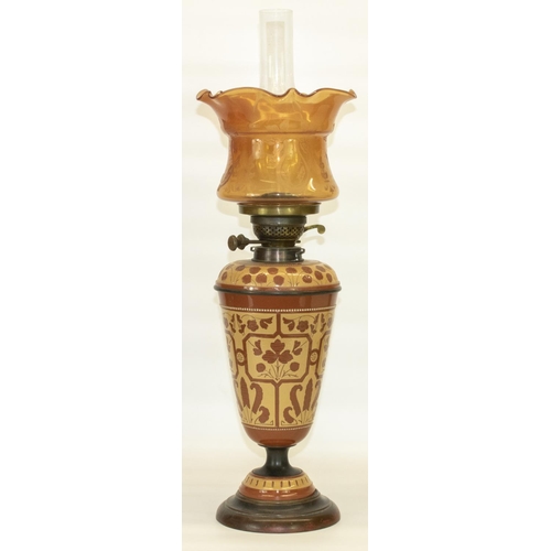 1077 - Aesthetic Movement Torquay Terracotta Co. pottery and brass oil lamp, the body and lift off reservoi... 