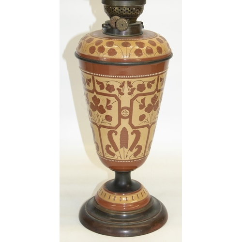 1077 - Aesthetic Movement Torquay Terracotta Co. pottery and brass oil lamp, the body and lift off reservoi... 