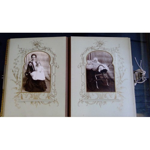 551 - Late Victorian embossed leather photograph album containing carte de visite photographs and cabinet ... 