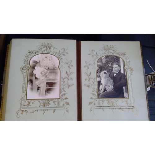 551 - Late Victorian embossed leather photograph album containing carte de visite photographs and cabinet ... 