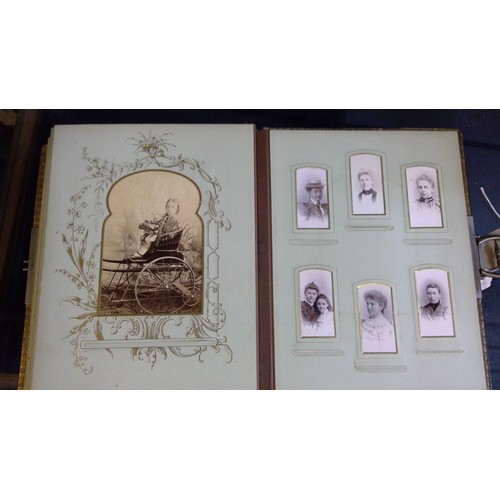 551 - Late Victorian embossed leather photograph album containing carte de visite photographs and cabinet ... 