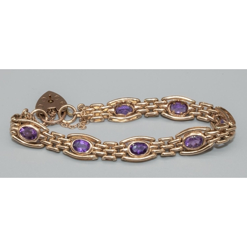 1023 - 9ct yellow gold three bar gate bracelet set with amethyst, with heart padlock clasp and safety chain... 