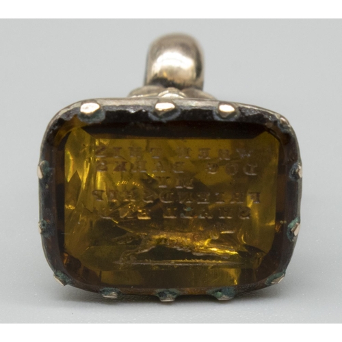 1032 - Yellow metal Georgian seal fob set with citrine intaglio of running dog inscribed 'When This Dog Bar... 