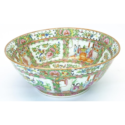 1086 - Modern Canton circular bowl, decorated in famille vert enamels with figures and garden landscapes in... 