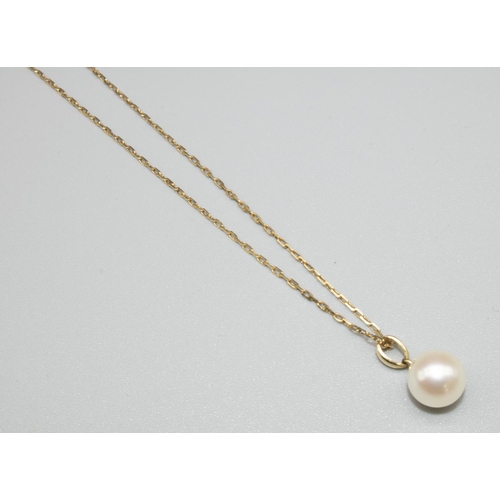 1037 - Mikimoto 14ct yellow gold single pearl pendant on gold chain necklace, both stamped K14, 2.1g