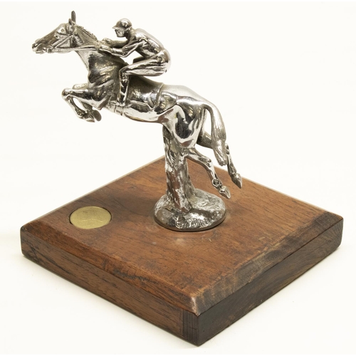 1131 - After Charles Paillet, a chromed metal car mascot, in the form of a race horse and jockey taking a f... 