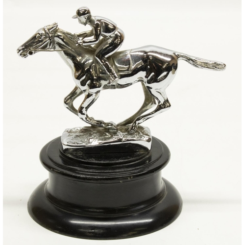 1133 - After Louis Lejeune: a chromed metal car mascot in the form of a racehorse with jockey up, stamped o... 