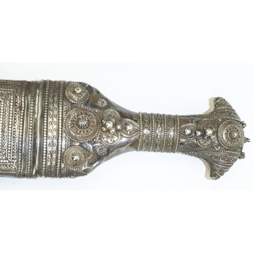 1223 - Omani Saidi Khanjar dagger/ornamental scabbard with sharply curved blade, white metal ornate wirewor... 