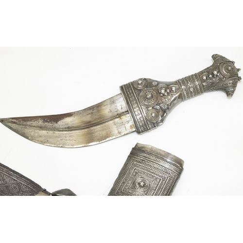 1223 - Omani Saidi Khanjar dagger/ornamental scabbard with sharply curved blade, white metal ornate wirewor... 