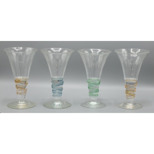 1107 - Set of four Gillies Jones of Rosedale wine glasses, trumpet bowls on tapering stems entwined with co... 