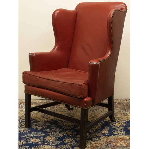 1369 - George III upholstered armchair, wing back with outsplayed arms and loose seat cushion, brass nail u... 