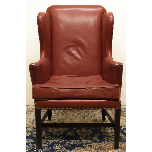 1369 - George III upholstered armchair, wing back with outsplayed arms and loose seat cushion, brass nail u... 