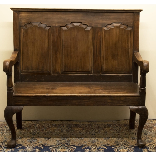 1373 - Small stained as oak pine settle, raised back with moulded top rail above three fielded panels, soli... 
