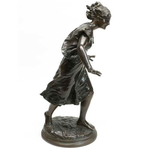 1120 - After Luca Madrassi (1848-1919); Bronze model  of a girl playing Blind-Man's-Buff, with a ribbon ove... 