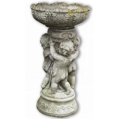 1454 - Composite stone birdbath, circular leaf cast bowl supported by three cherubs, on stepped base, D50cm... 