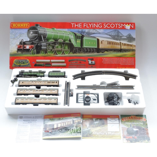 112 - Boxed Hornby HO gauge Flying Scotsman electric train set. Engine front bogie is disconnected, the lo... 