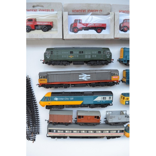 114 - Collection of used OO gauge diesel engines, wagons, vehicles and track with a Hornby power unit. Inc... 