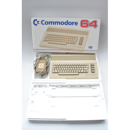 20 - Boxed Commodore 64C Light Fantastic personal computer with tape loader, 10 games including Army Days... 