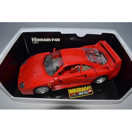 31 - Five 1/18 diecast Ferrari models, 4 Burago and 1 UT Models. Includes F355 Berlinetta (UT), F40 (1987... 