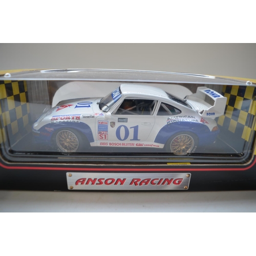 Two 1/18 diecast racing Porsche 911 GT2 models from Anson Models 
