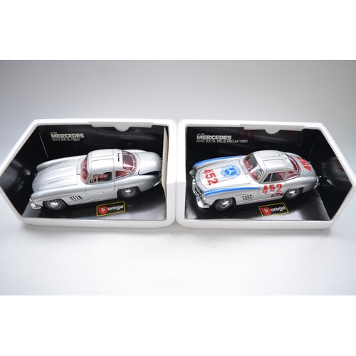 39 - Six 1/18 scale diecast Mercedes car models from Burago to incl. 2 300SL (1964, one white, one black)... 