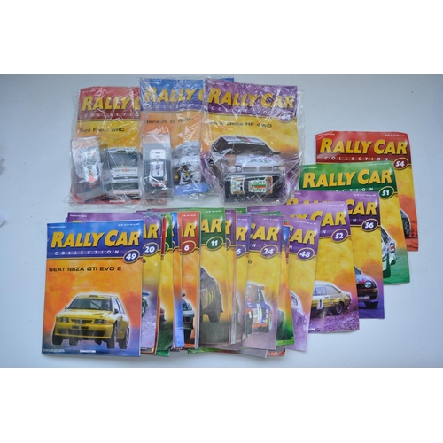 55 - Extensive collection of Rally Car magazines with cased stackable diecast model rally cars from DeAgo... 