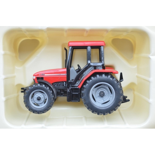 59 - Four boxed 1/32 Britain's Tractor models to include Britain's Elite Case IH cx80 Tractor (item no 14... 