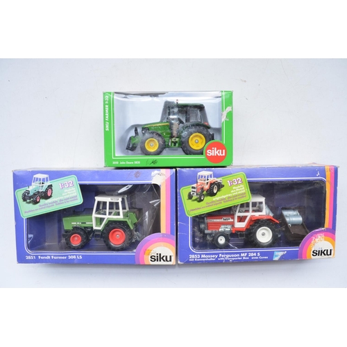 64 - Three 1/32 tractor models by Siku to include John Deere 5820, Fendt Farmer 308LS, Massey Ferguson MF... 