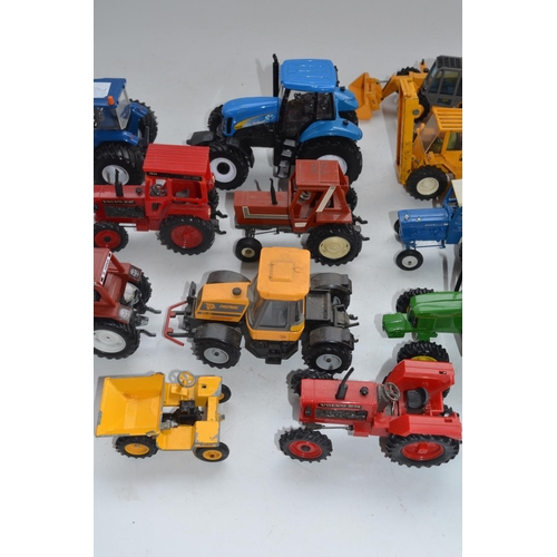 67 - Collection of used Britain's tractor models, mostly 1/32 scale