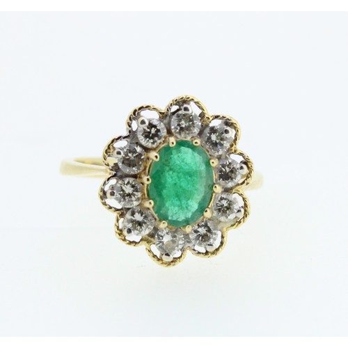 1020 - 18ct yellow gold emerald and diamond cluster ring, the central oval cut emerald surrounded by a halo... 