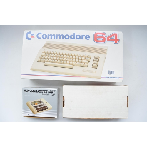 20 - Boxed Commodore 64C Light Fantastic personal computer with tape loader, 10 games including Army Days... 