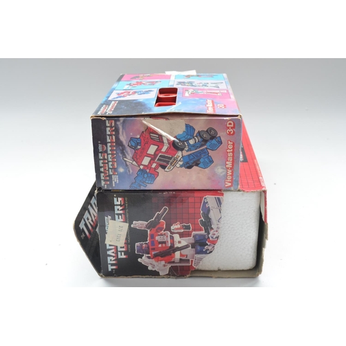 25 - Boxed Hasbro Optimus Prime Transformer, excellent little used condition, box fair (torn end flap) an... 