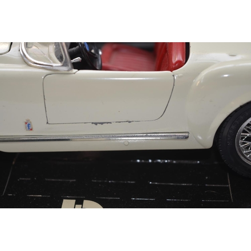 37 - Seven 1/18 scale diecast model cars from Bburago to include Jaguar E Type Cabriolet (1961), Alfa Rom... 