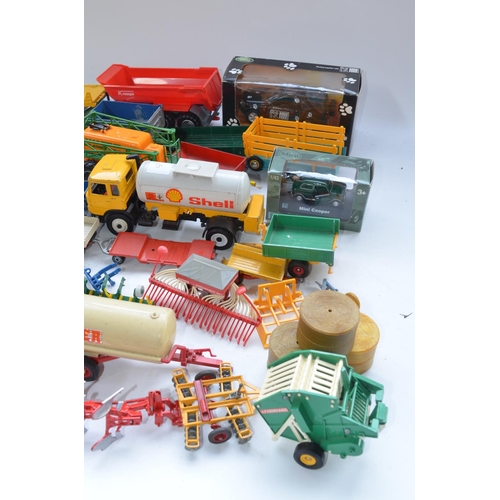 68 - Collection of used farm models, mostly Britain's and Siku 1/32 scale, incl. trailers, roller, baler,... 