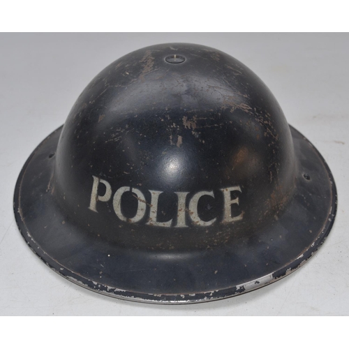 709 - WW2 era British Police helmet