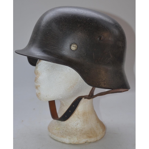 714 - WW2 German Stahlhelm steel helmet, stamped inside 2979