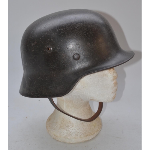 714 - WW2 German Stahlhelm steel helmet, stamped inside 2979