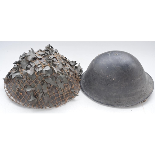 721 - Two British Army MkIV Turtle helmets with liners, one dated 1955, the other no visible markings