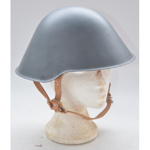 722 - Post war East German steel helmet, refurbished. Markings very faint, only number 8 and a 3 visible u... 