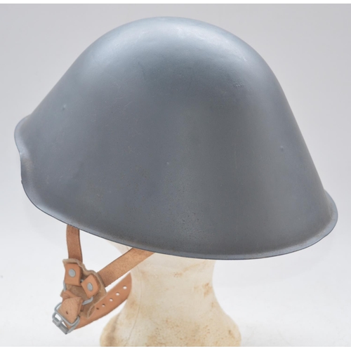 722 - Post war East German steel helmet, refurbished. Markings very faint, only number 8 and a 3 visible u... 