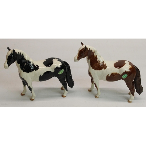 194 - Two Beswick pinto ponies, piebald and skewbald, model #1373 (2)