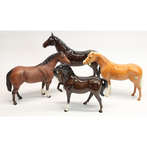 199 - Three Beswick bay stallions and a Beswick dun stallion, max. H23.5cm