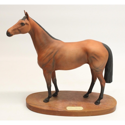 216 - Royal Doulton model of racehorse Red Rum, on wooden plinth, H32cm