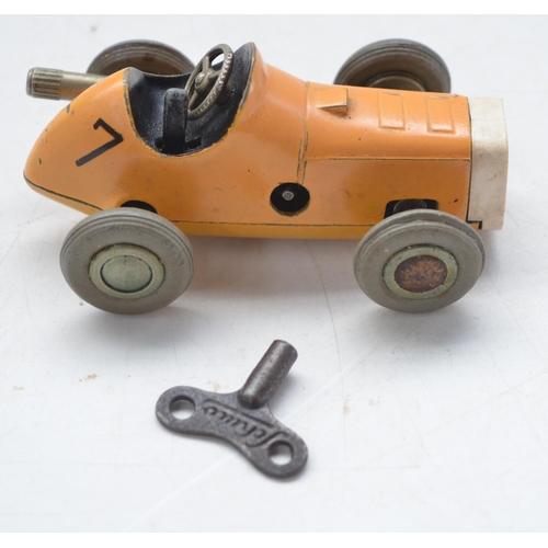 420 - Schuco West German made Micro Racer with key. Mechanism winds and holds tension with running lock en... 