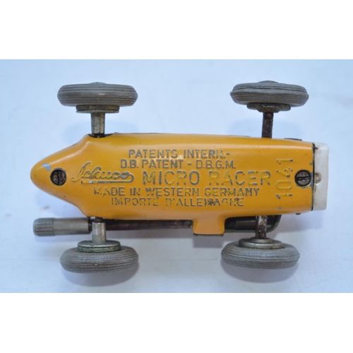 420 - Schuco West German made Micro Racer with key. Mechanism winds and holds tension with running lock en... 