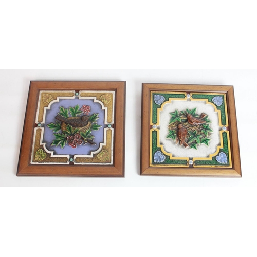 135 - Minton Hollins & Co majolica tiles decorated with birds, framed, 18.5 x 18.5cm excl. frames (2)